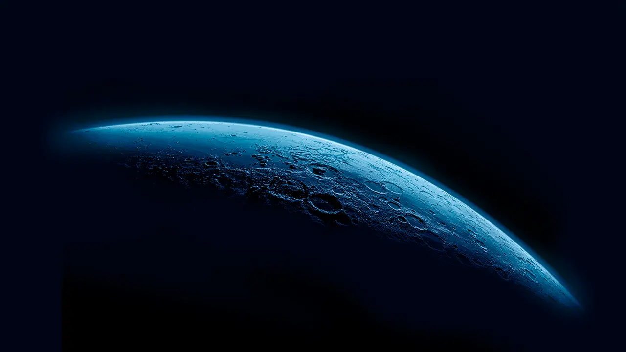 Image of a moon with a blue glow